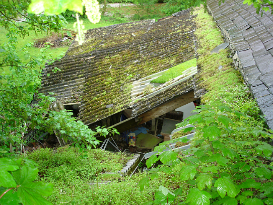The dilapidated lean-to roof at Upperdale House, Monsal Dale, prior to repairs beginning