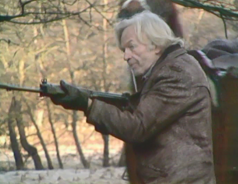 Fenton fires at the pack of wild dogs